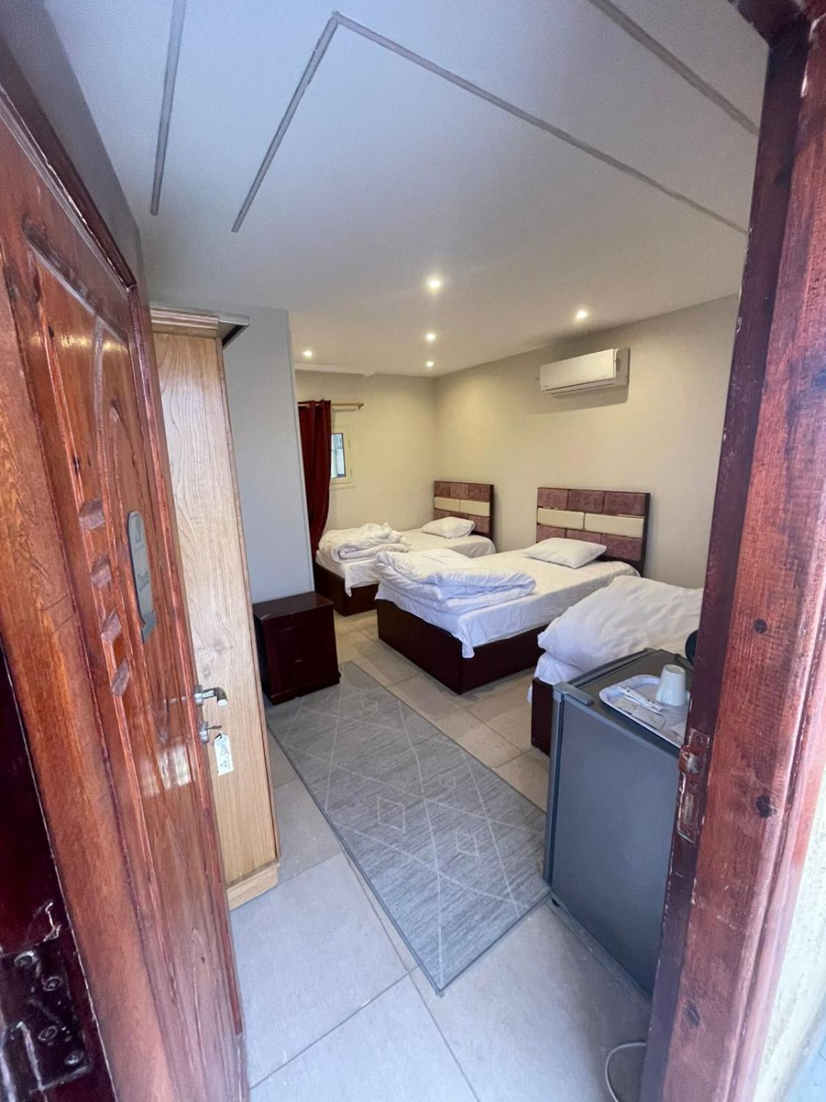 Sami Holiday Inn - Pyramids View Rooftop Al Kawm al Akhdar Bagian luar foto