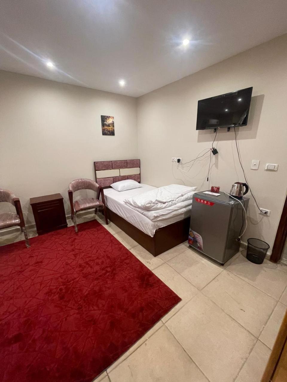Sami Holiday Inn - Pyramids View Rooftop Al Kawm al Akhdar Bagian luar foto