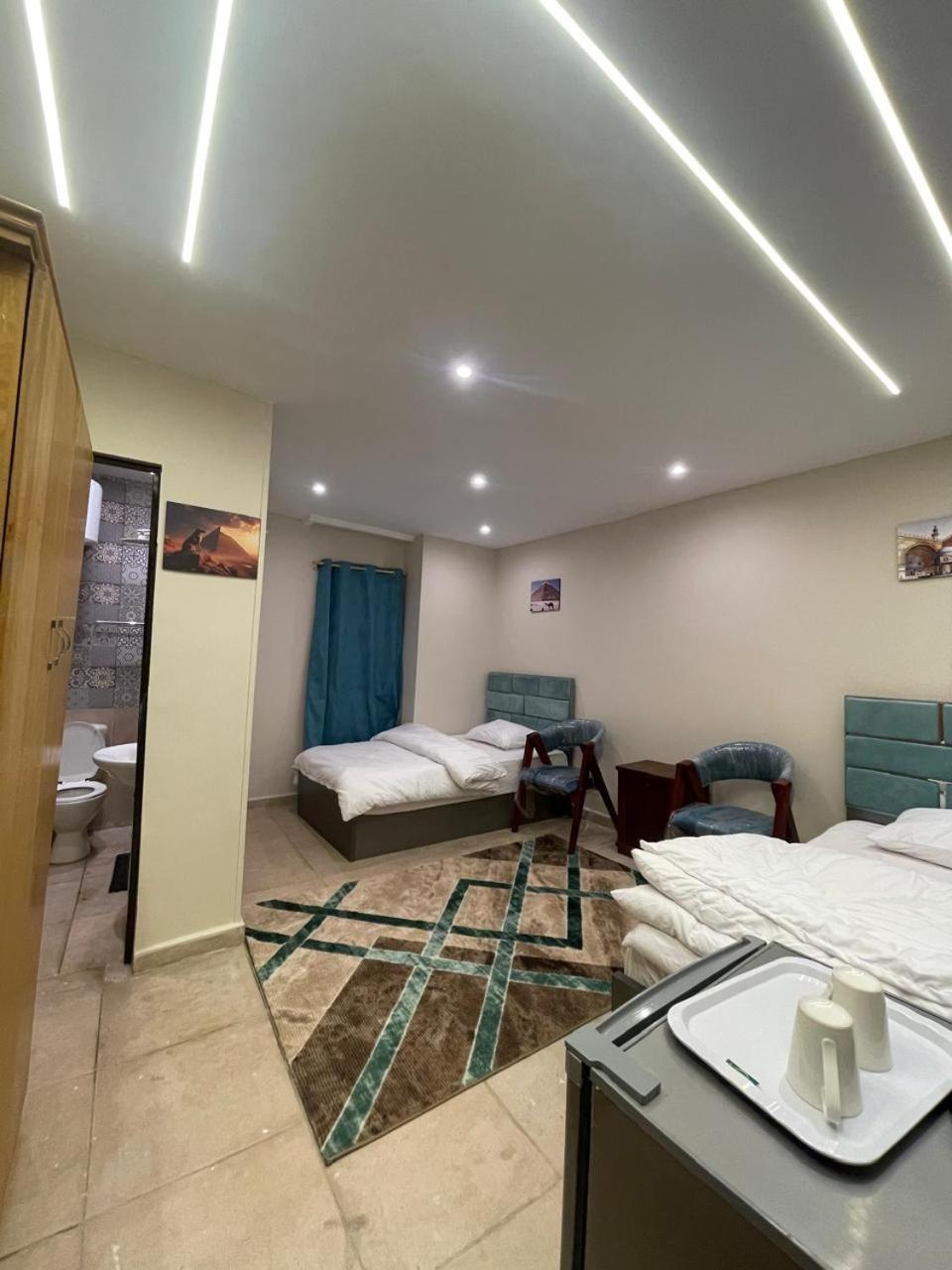 Sami Holiday Inn - Pyramids View Rooftop Al Kawm al Akhdar Bagian luar foto